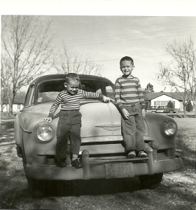 Darrell and Kenny Ray Playing on the Old Buick